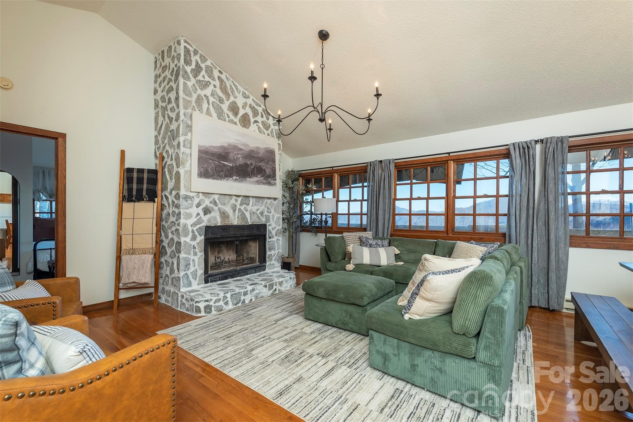 Main floor living room. Step into the heart of the home. Our living area is designed for connection, comfort, and unforgettable moments. - Mars Hill