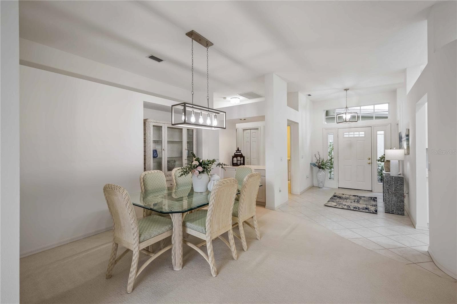Dining Room and foyer - laundry room off to the left. - 547 FALLBROOK DR, VENICE