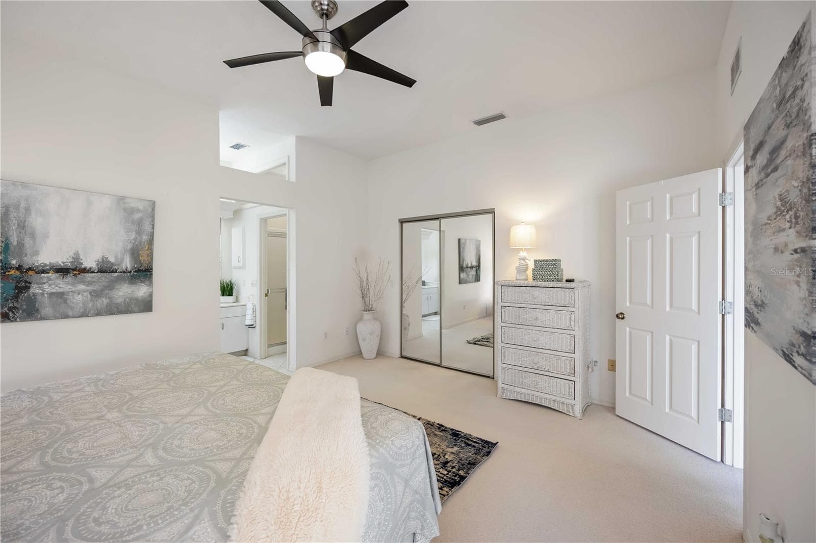 Primary Bedroom has huge walk in closet, and ensuite  tub and separate shower. - 547 FALLBROOK DR, VENICE