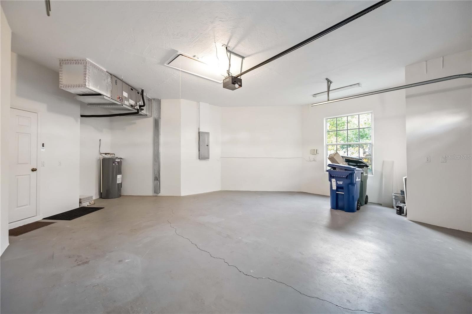 Garage with 2 yr old AC and new hot water heater - garage is extra large - 547 FALLBROOK DR, VENICE