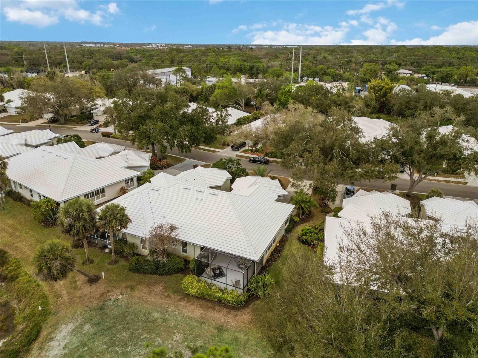 Aerial of the home and lanai - 547 FALLBROOK DR, VENICE