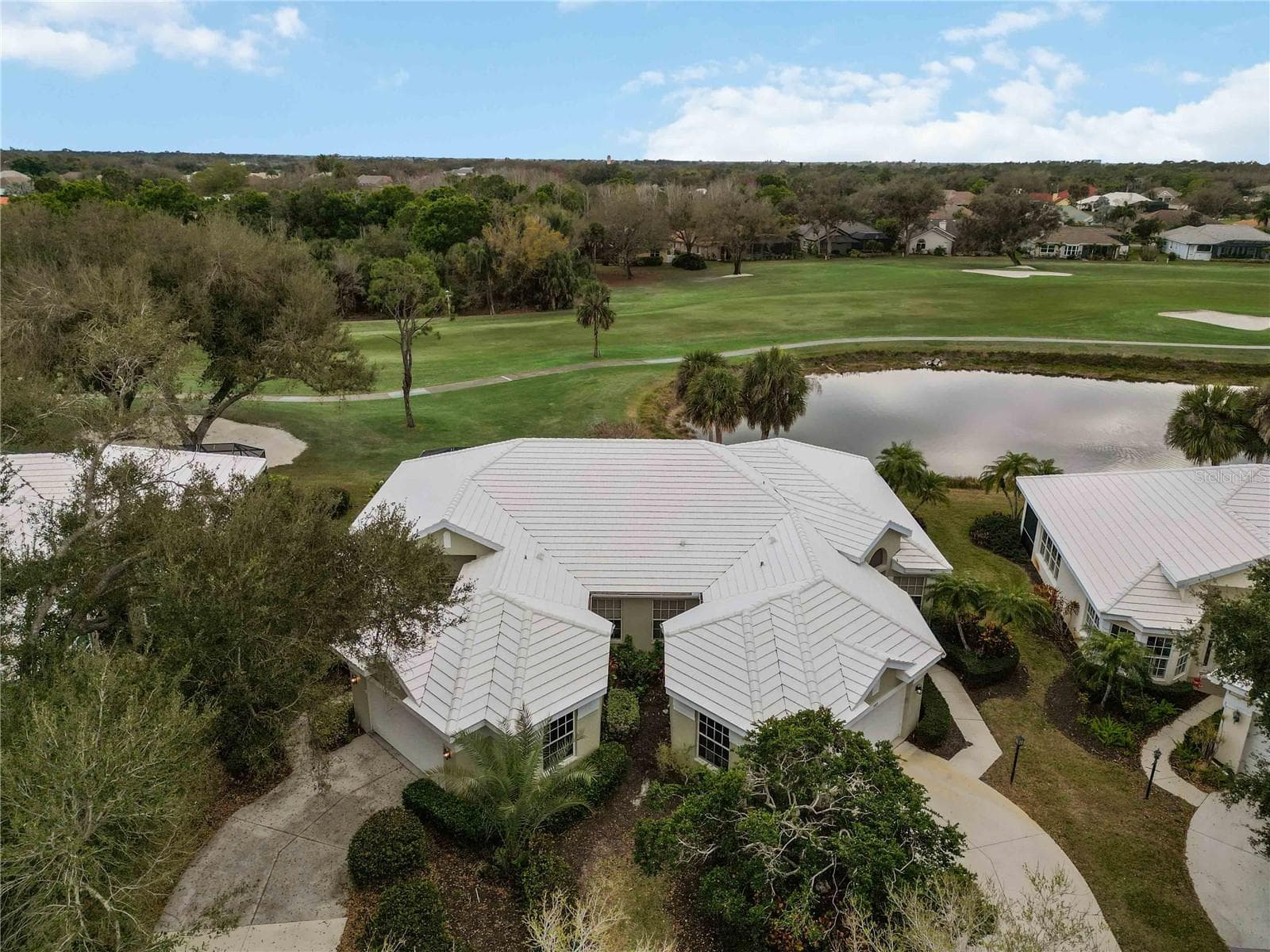 12th fairway - ponds, and mature landscaping for as far as you can see - 547 FALLBROOK DR, VENICE