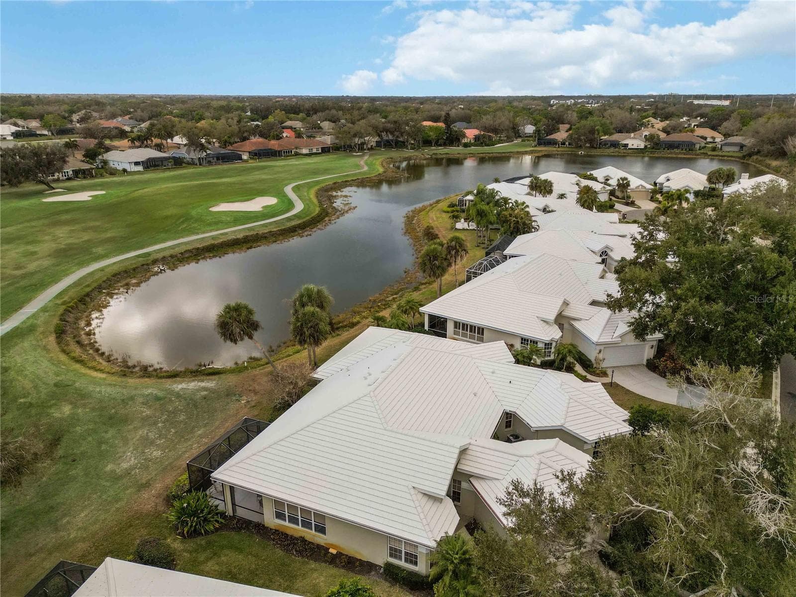12th fairway - ponds, and mature landscaping for as far as you can see - 547 FALLBROOK DR, VENICE