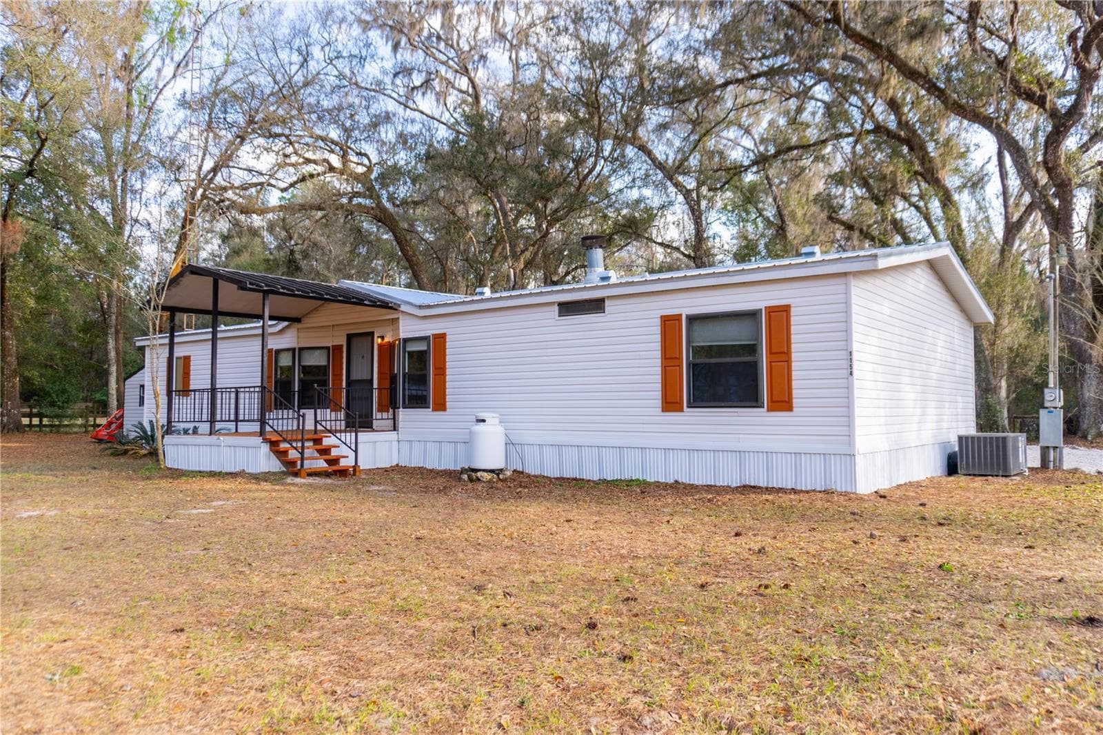 Manufactured Home at 1154 SE 95TH ST, OCALA, photo 9 of 96