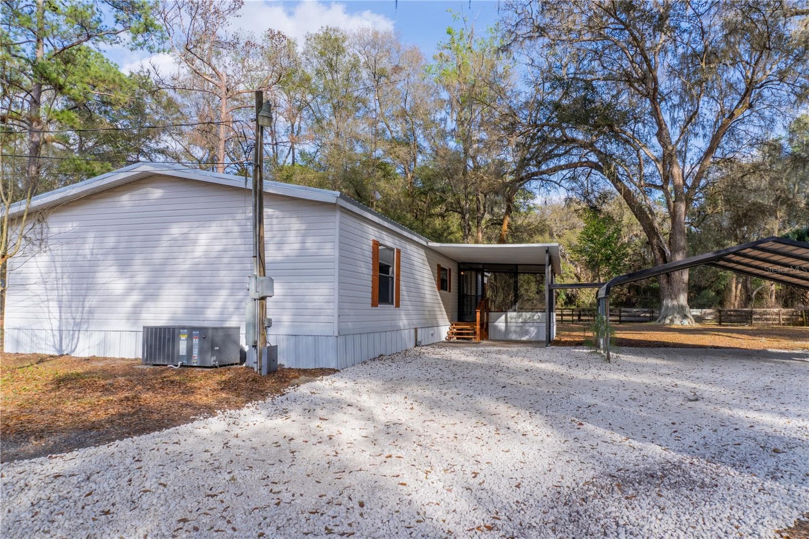 Manufactured Home at 1154 SE 95TH ST, OCALA, photo 10 of 96