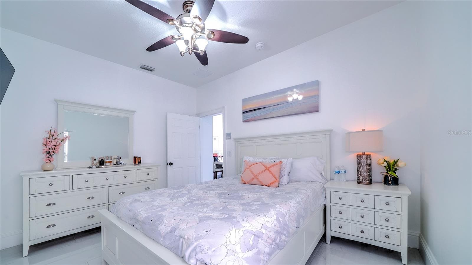 Guest bedroom on the first floor with a full bathroom. - 6956 LUCCA ST, ORLANDO