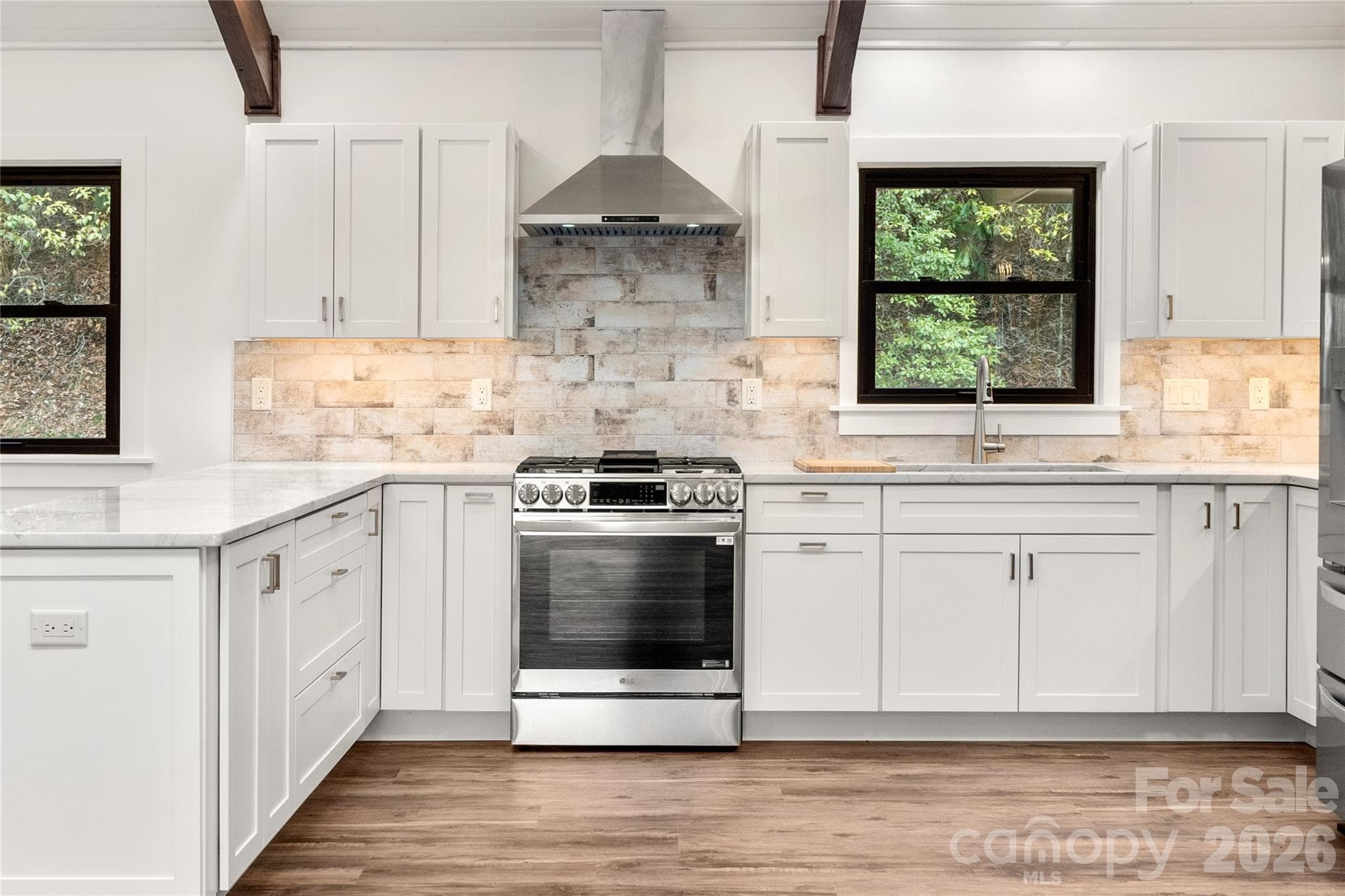 Custom cabinets provide both style and abundant storage. - Waynesville