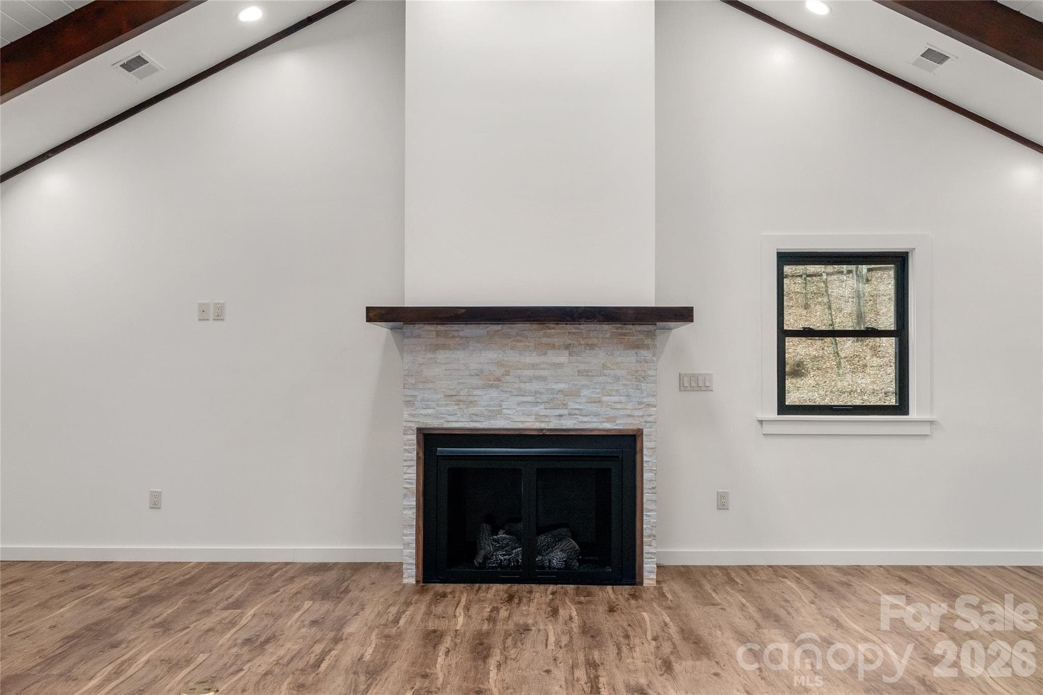 New gas fireplace and striking architectural details. - Waynesville