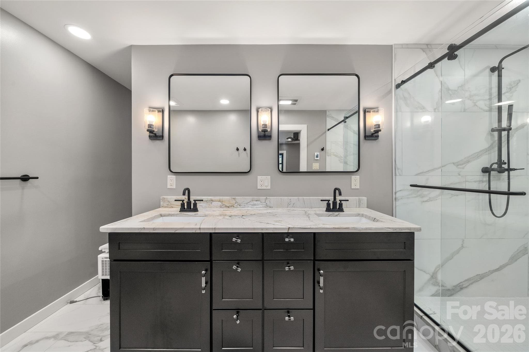 Fully renovated primary bath featuring heated floors for added comfort. - Waynesville