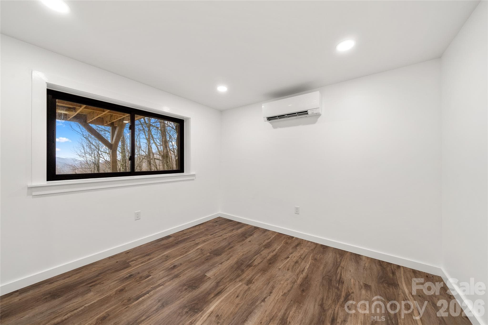 Downstairs/Basement 2nd Bedroom w/new flooring, lighting, windows - Waynesville