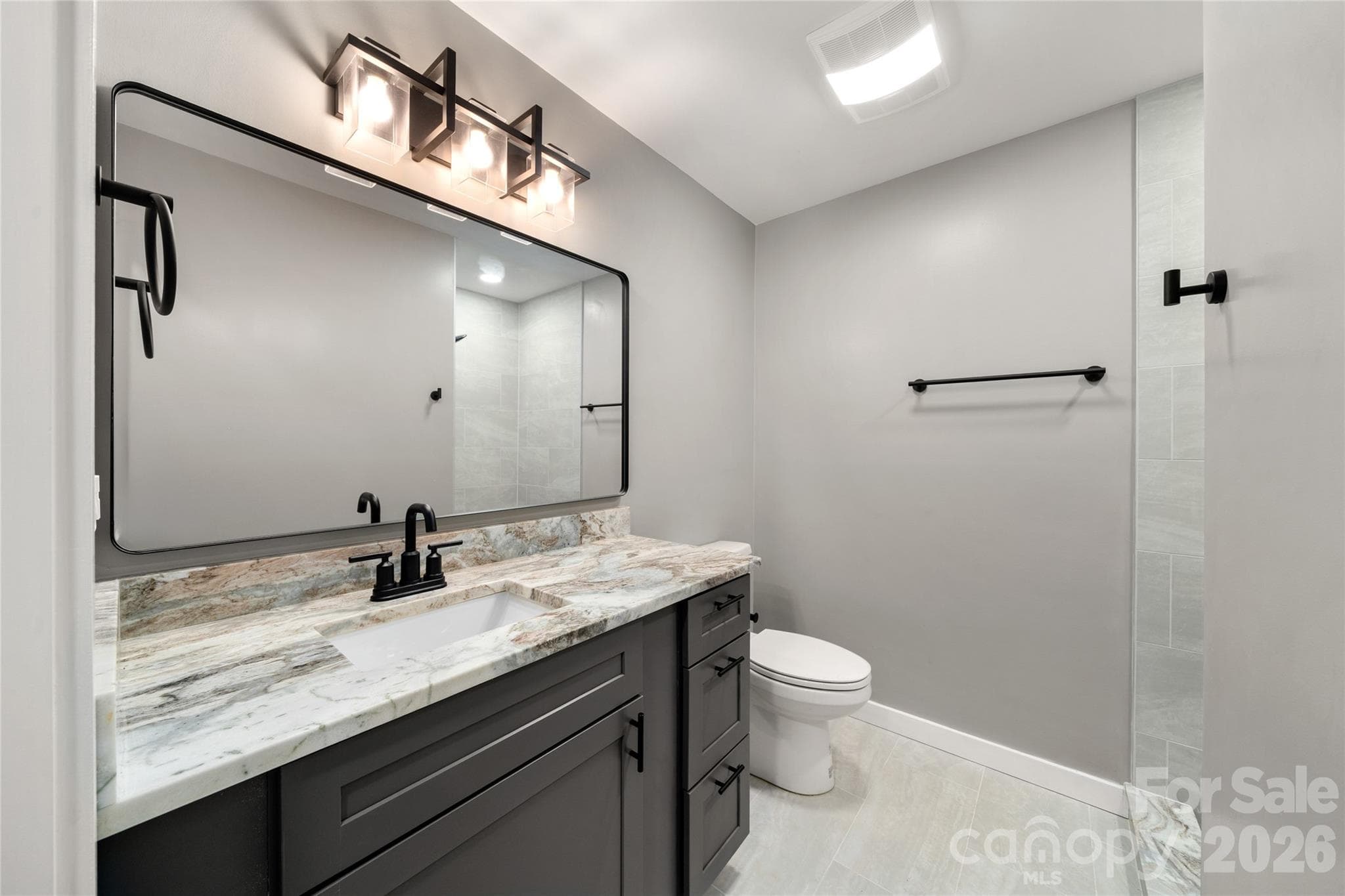 Beautifully renovated 3rd bath with modern fixtures and finishes. - Waynesville