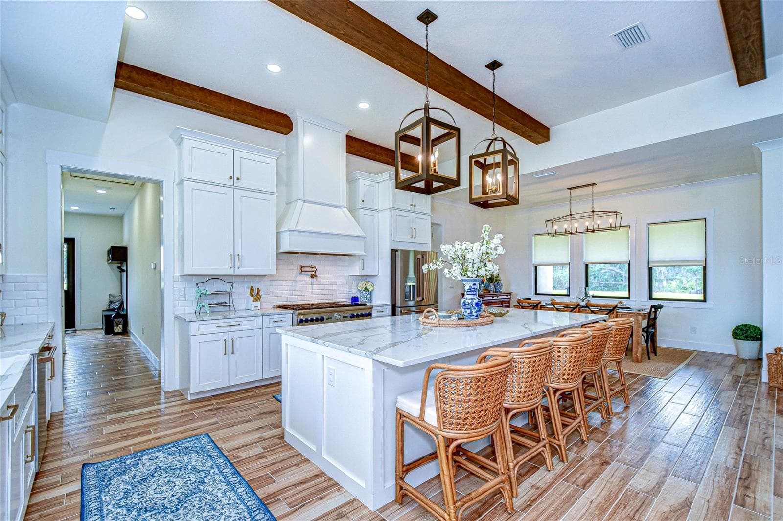 Kitchen with a massive center island - 111 ALAFIA ESTATES LN, LITHIA