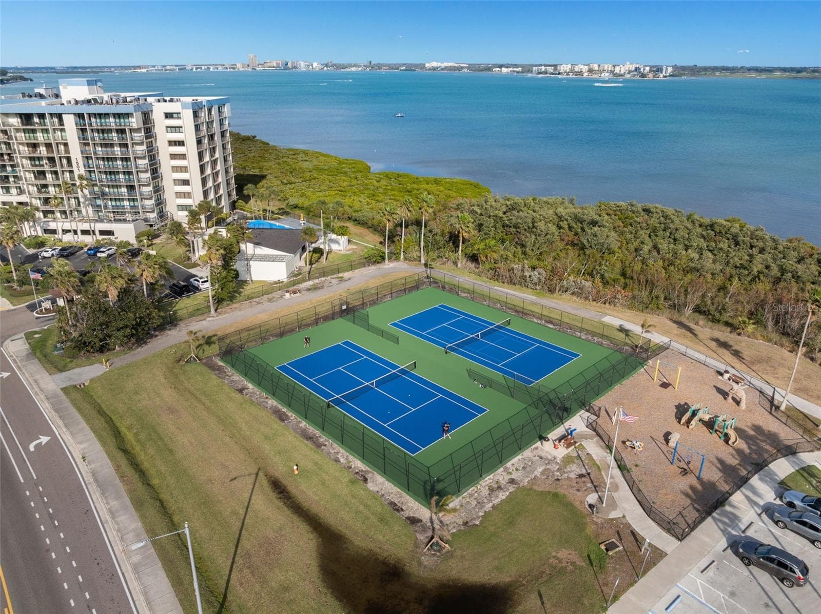 Access to the tennis courts is included. - 1501 GULF BLVD #603, CLEARWATER BEACH