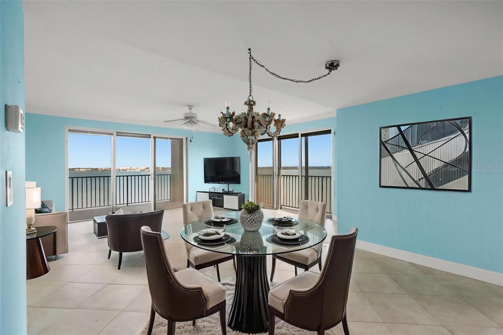 Virtually staged west living room and dining area - 1501 GULF BLVD #603, CLEARWATER BEACH