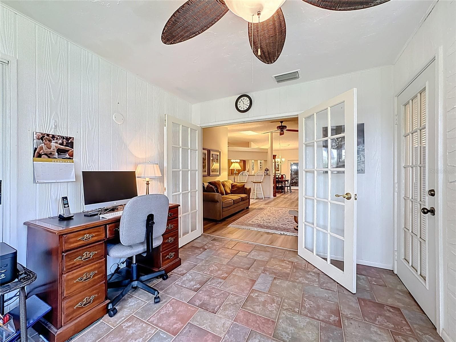 Double French doors between Florida and family rooms. - 5611 GARDEN LAKES DR, BRADENTON