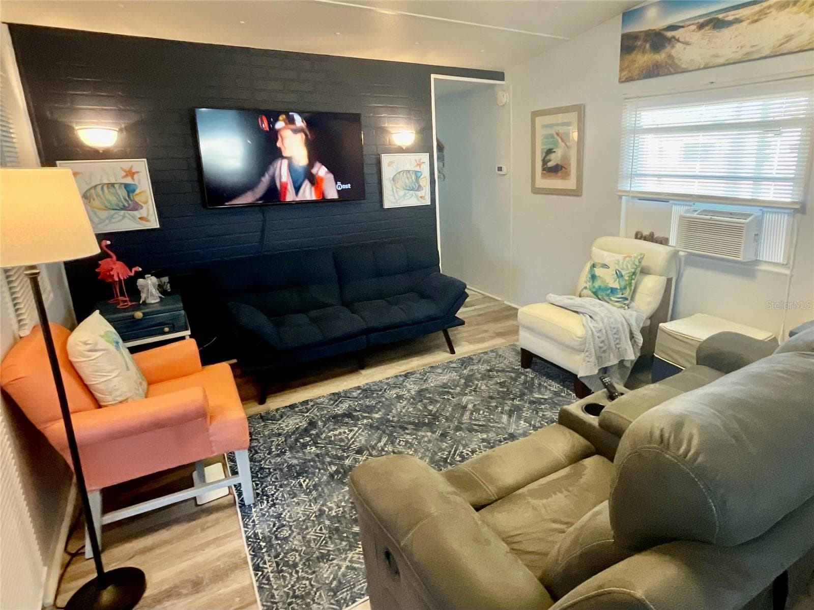 Cozy, cute furniture and furnishings to stay with you including both televisions. - 6580 SEMINOLE BLVD #510, SEMINOLE