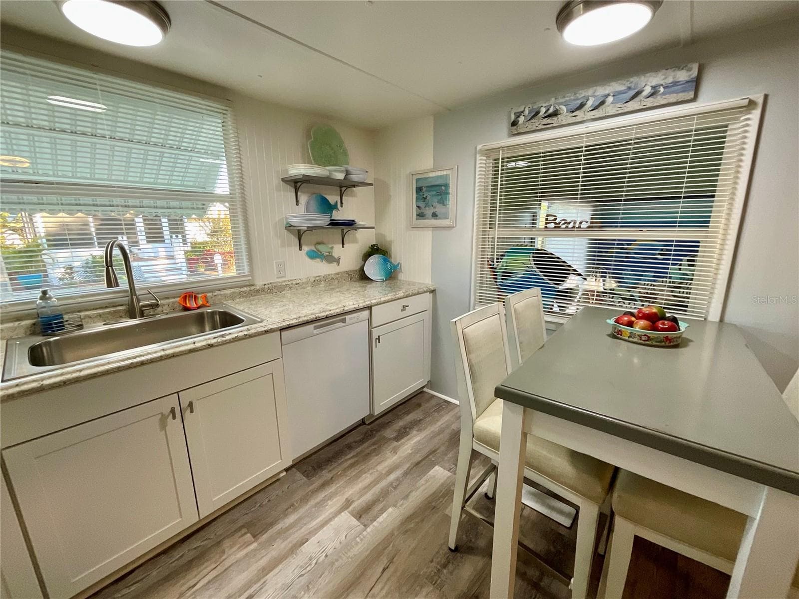 Light and Bright kitchen with new dishwasher and deep, one bowl stainless steel sink with windows for natural light - 6580 SEMINOLE BLVD #510, SEMINOLE
