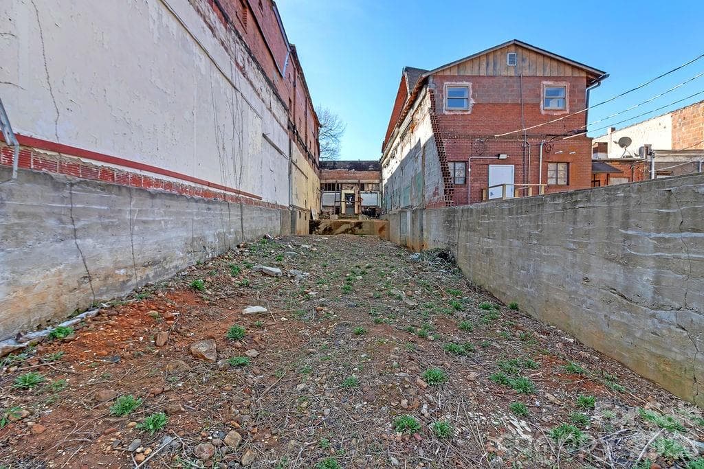 Back view of where your build site would be. - Brevard