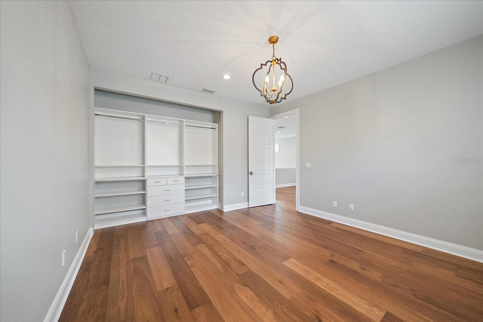 Bedroom 3 with custom built-in closet- 2nd Floor - 2207 WISTERIA ST, SARASOTA