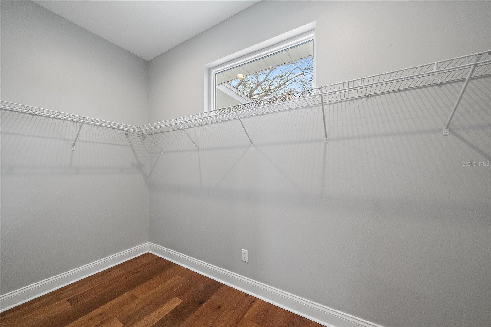 Double Primary Bedroom Walk-in Closet - 2nd Floor - 2207 WISTERIA ST, SARASOTA