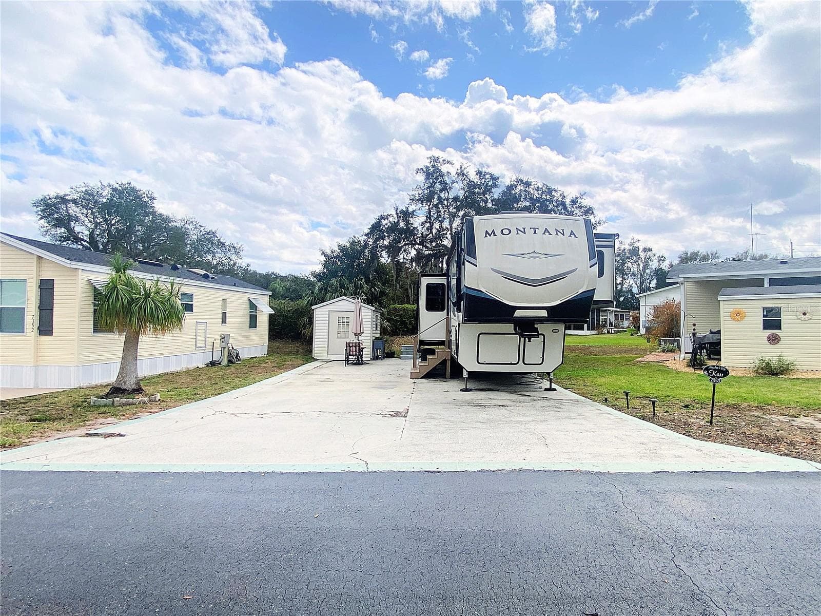 60x40 lot paved lot with storage shed - 7350 MIDWAY LN #54, LAKE WALES