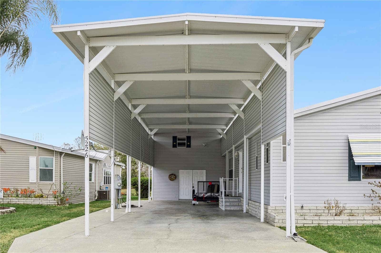 Manufactured Home at 5226 ISLAND VIEW CIR N, POLK CITY, photo 4 of 76