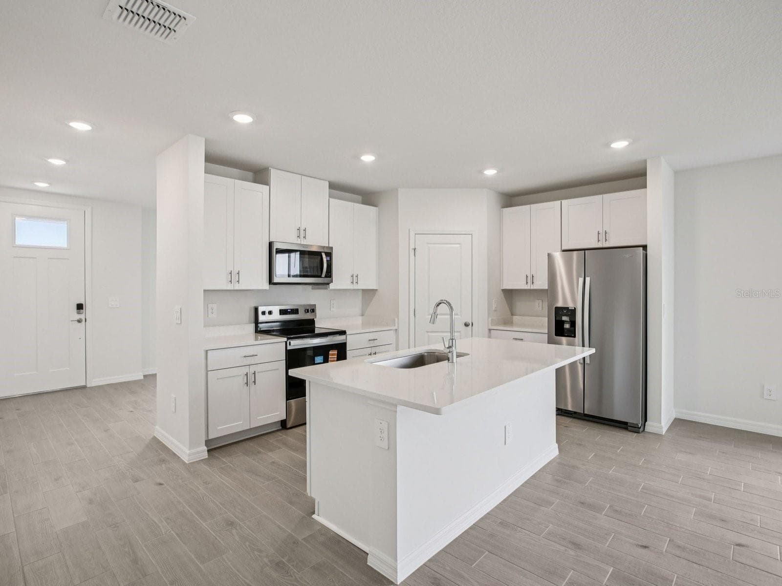 Interior photos are not of the actual home but are photos of the builder home with the same floorplan with similar interior finishes and features. - 7214 RAY CREEK DR, BROOKSVILLE