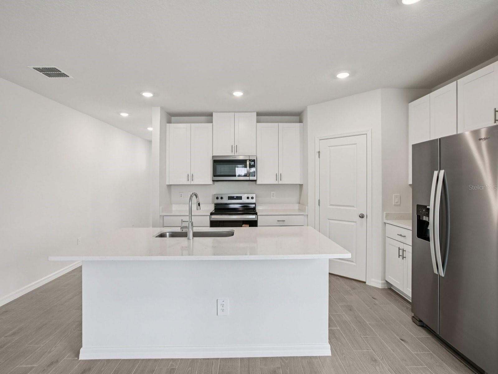 Interior photos are not of the actual home but are photos of the builder home with the same floorplan with similar interior finishes and features. - 7214 RAY CREEK DR, BROOKSVILLE