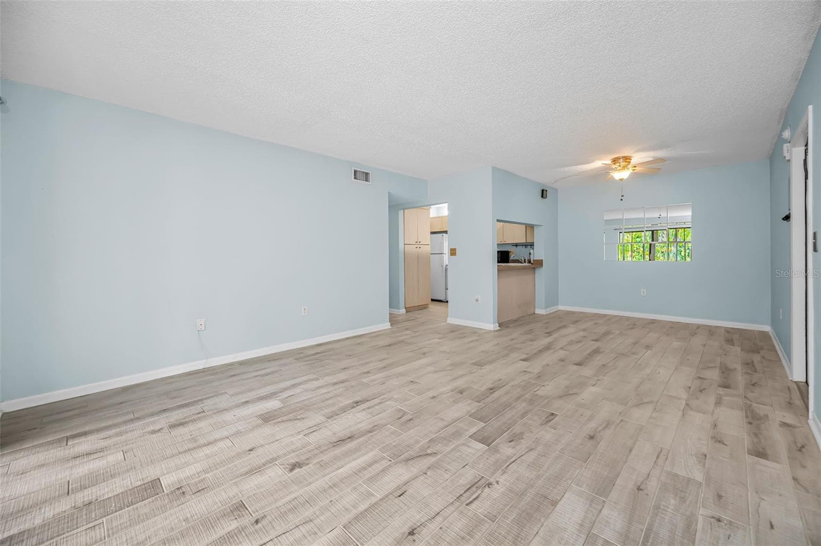Living room, dining room - 3232 LAKE PINE WAY E #C1, TARPON SPRINGS