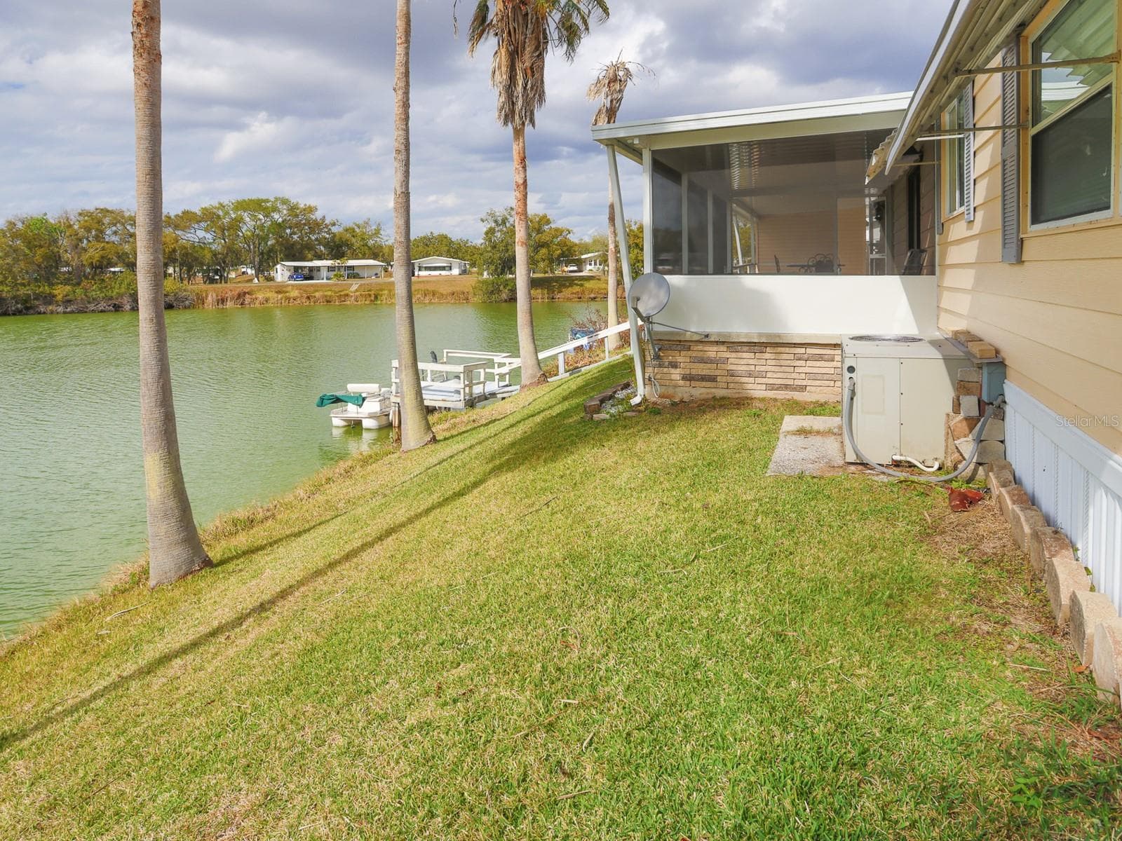 Backyard with view of the lake. - 2055 S FLORAL AVE #238, BARTOW