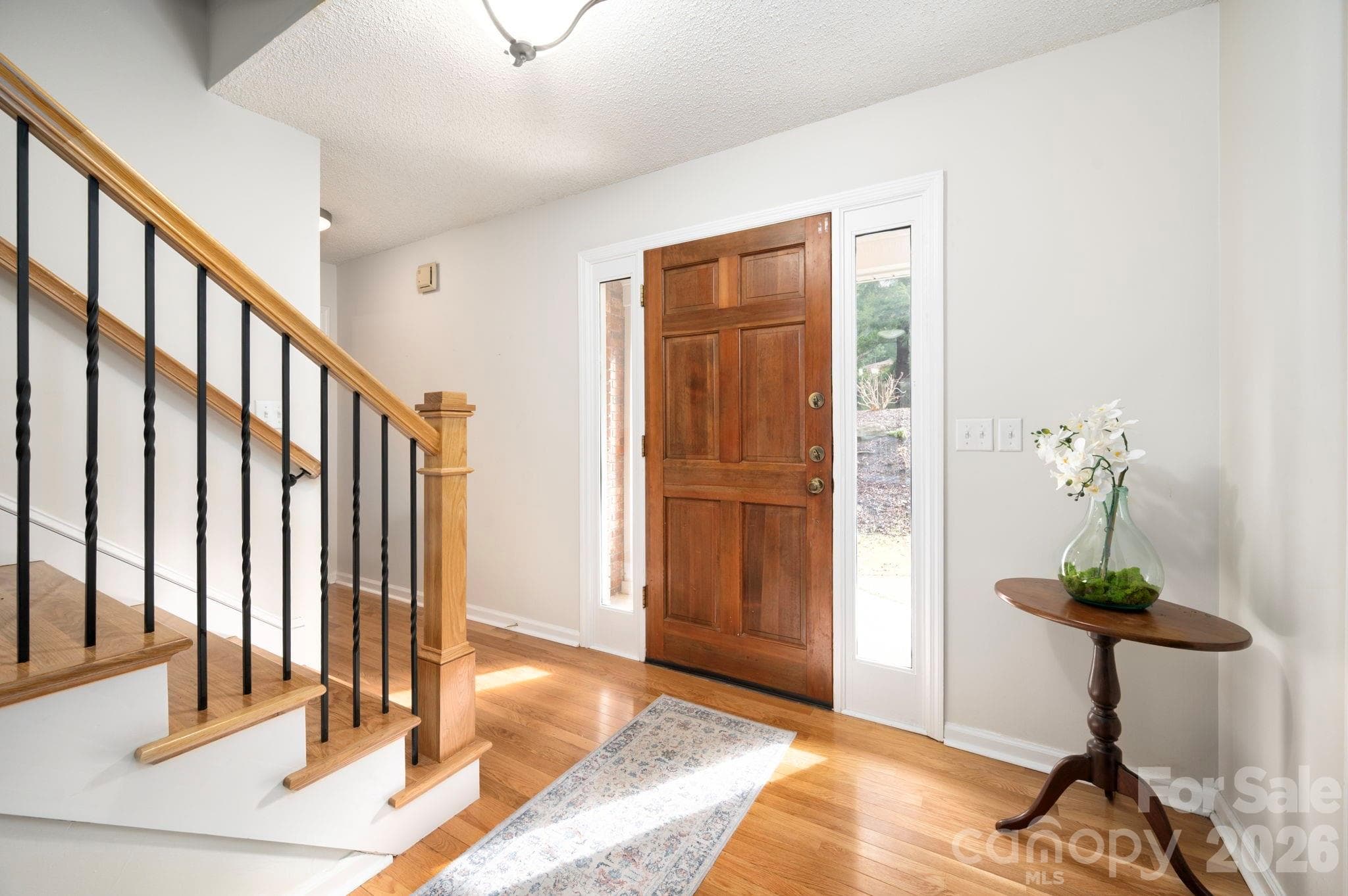 Front entry foyer staircase - 107 Ballantree Drive, Asheville