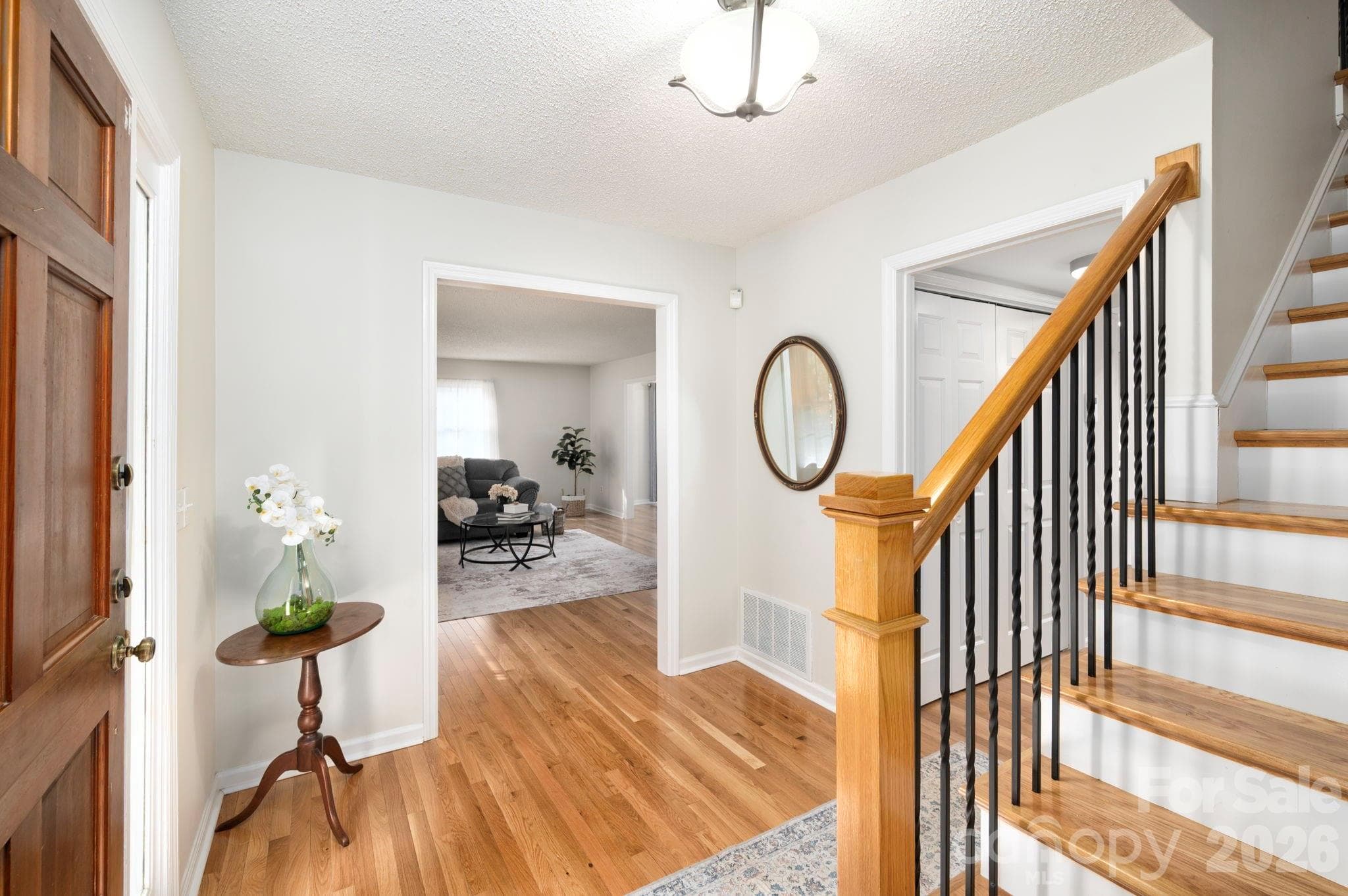 Entry foyer staircase landing - 107 Ballantree Drive, Asheville