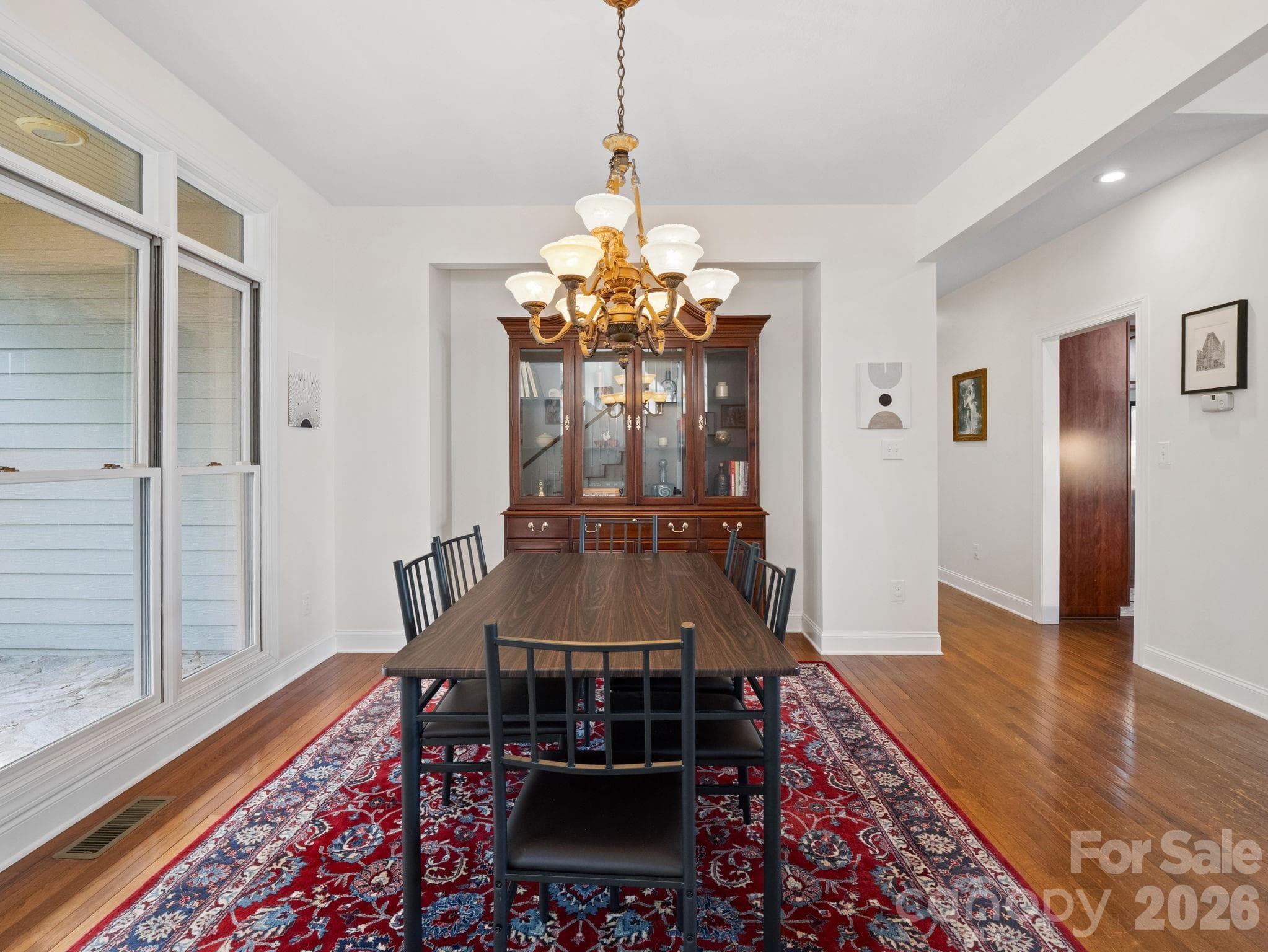 Dining room overlooks covered front patio - Lake Lure