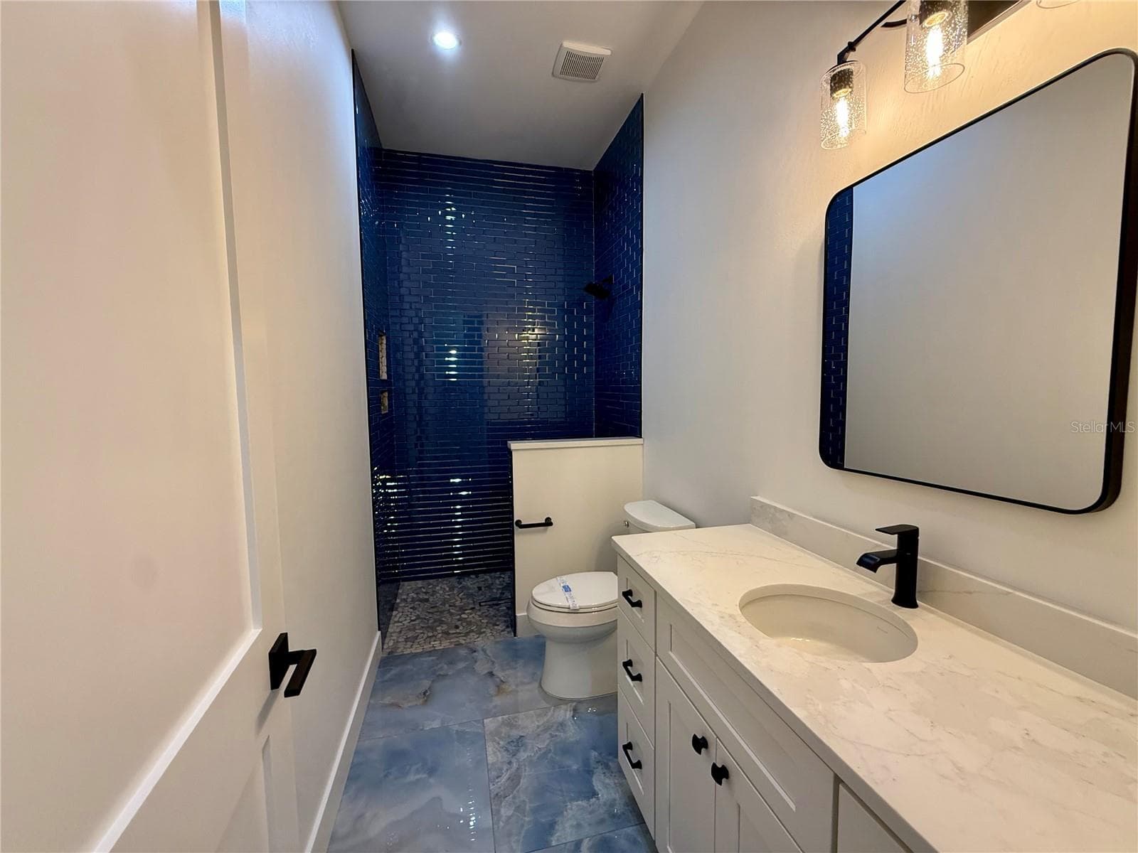 Guest Bath at Rear Bedroom - 520 WOODSTORK LN, PUNTA GORDA