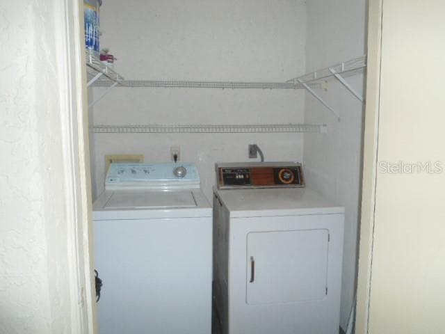 laundry closet and storage - 2800 COVE CAY DR #4D, CLEARWATER