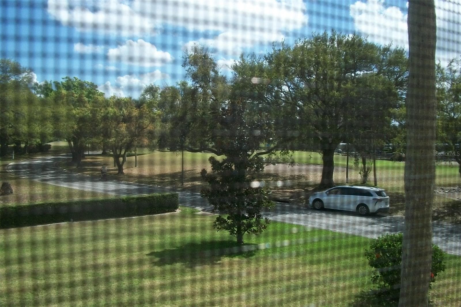 Florida room has window that open with Screens, for that fresh Florida air, Plus front door has screen door for great cross ventilation. - 2616 COVE CAY DR #207, CLEARWATER