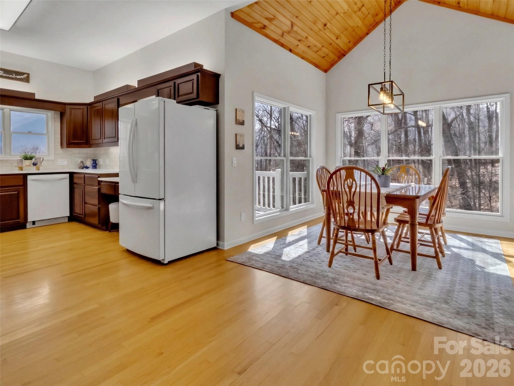 Kitchen Opens to Dining Area - 28 Mountain Breeze Drive, Maggie Valley