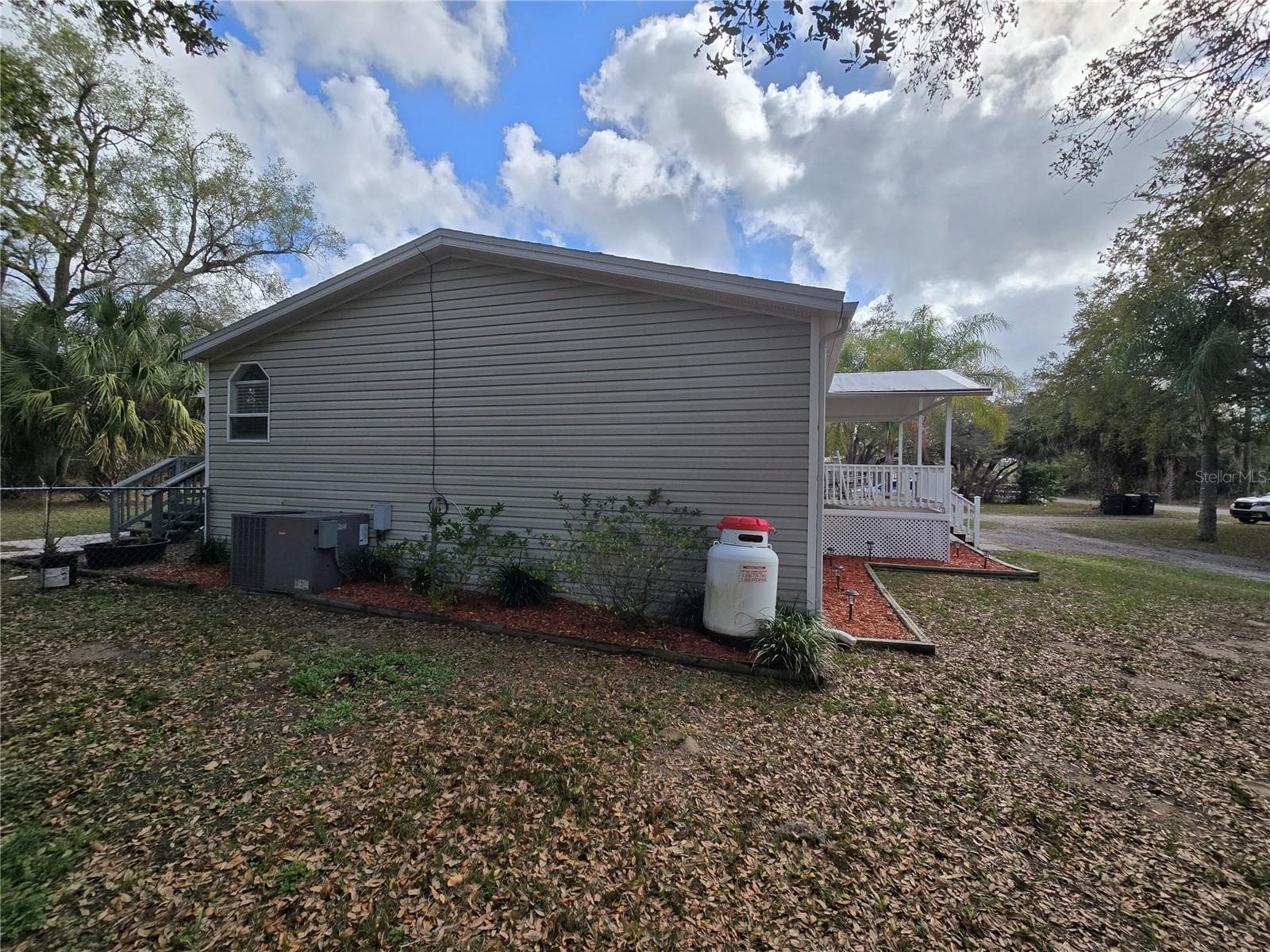 Manufactured Home at 5304 FAIRMONT RD, LAKE WALES, photo 2 of 92