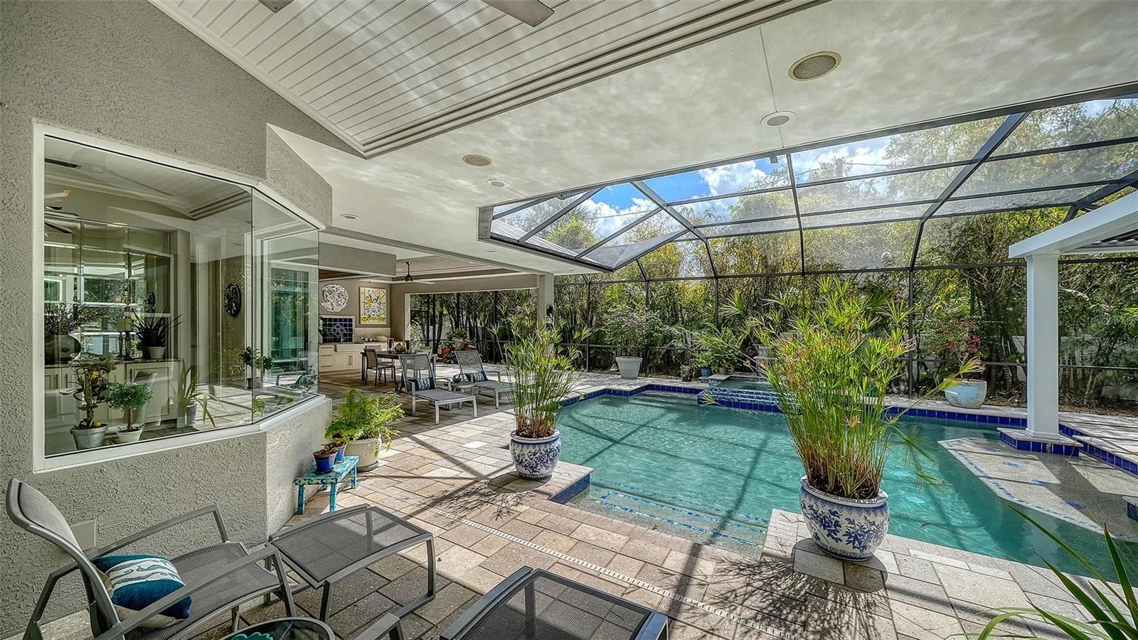 The view of your outdoor oasis as seen from the Great Room - 1794 CUNLIFF LN, SARASOTA