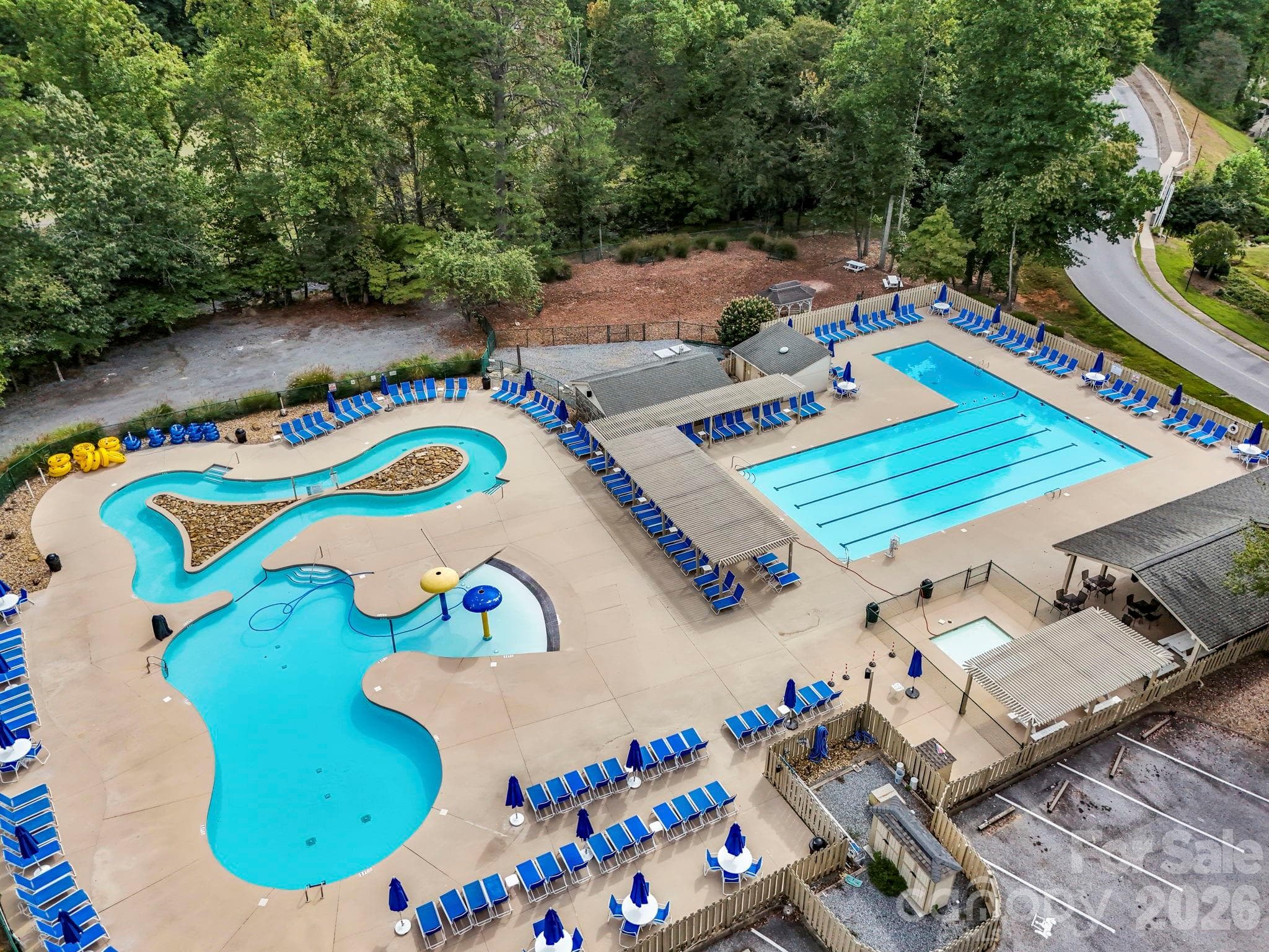 Two outdoor pools (and one inside the fitness center). Check out the lazy river! (photo taken pre-Helene) - 308 Bluebird Road, Lake Lure