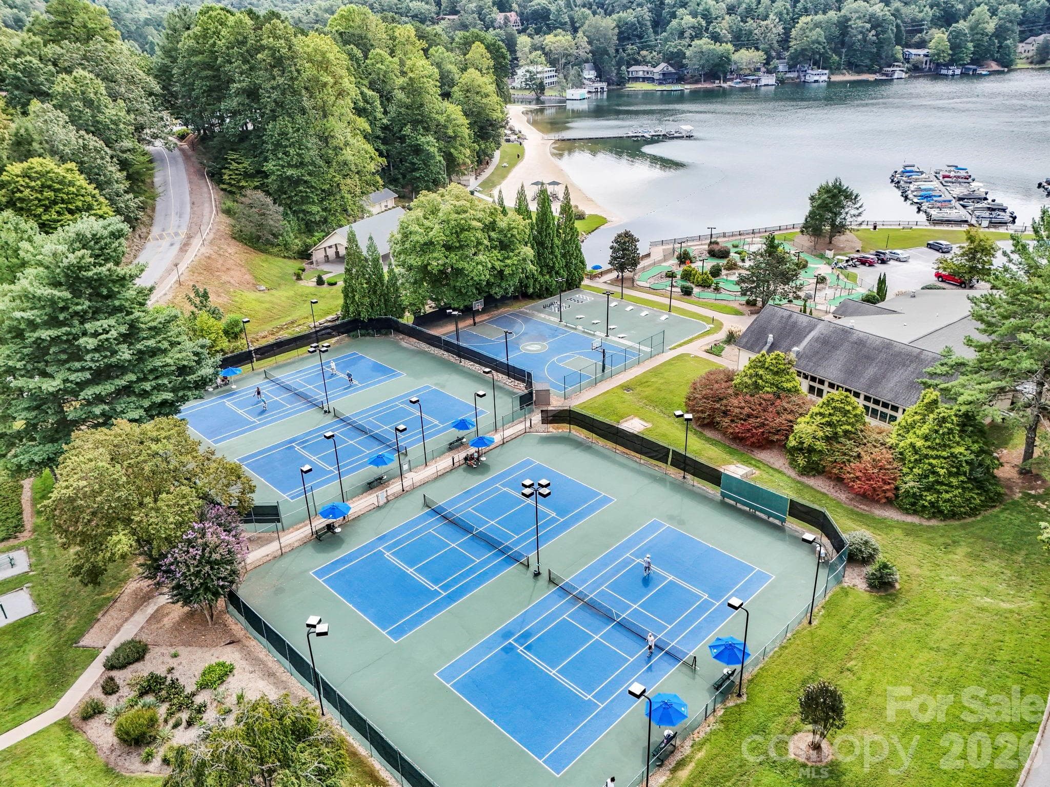 Tennis and pickleball courts, basketball and game courts (photo taken pre-Helene) - 308 Bluebird Road, Lake Lure