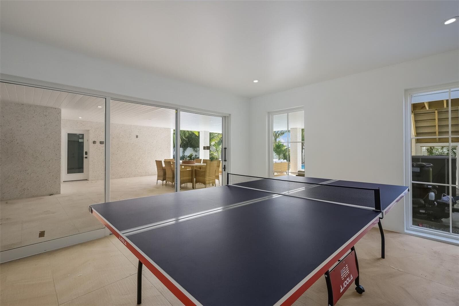 227 S Harbor Drive Holmes Beach FL 34217 MLS #A4684262Game room opens to pool and outdoor dining - 227 S HARBOR DR, HOLMES BEACH
