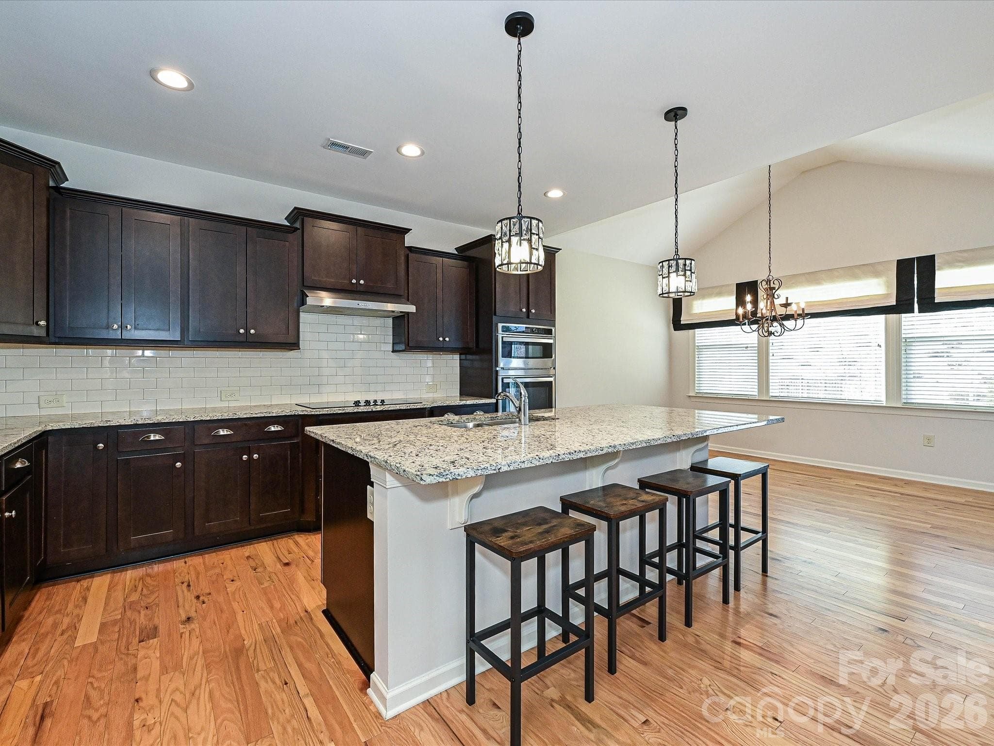 Chef's Kitchen with spacious Island & adjoining breakfast room - 2004 Rockbrook Lane, Belmont