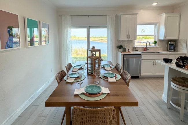 Model home - actual features may vary. - 10721 FOUNTAIN PALM CIR, BOKEELIA