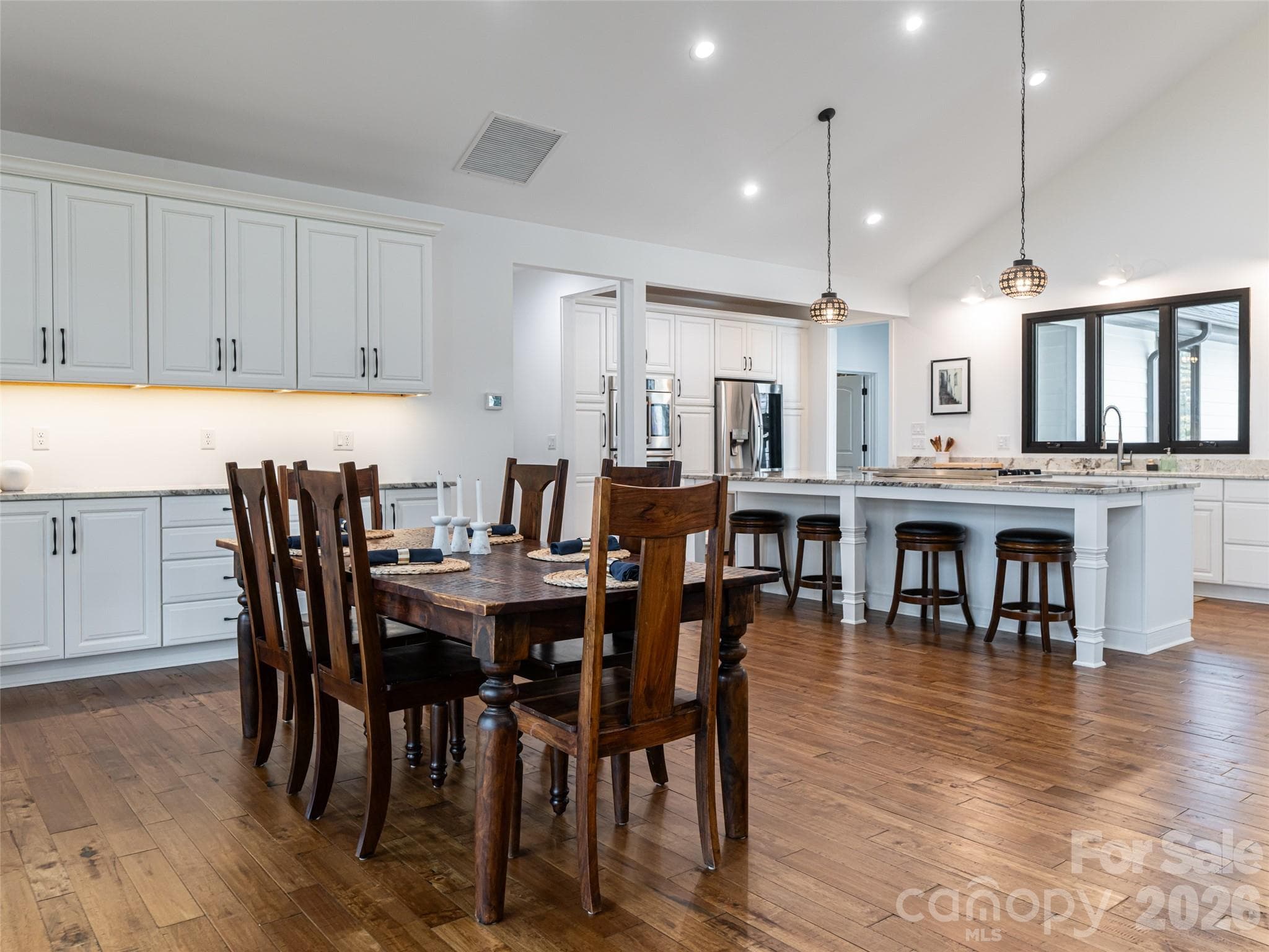 Dining Room open to the kitchen with built-ins - 508 Avery Creek Road, Arden