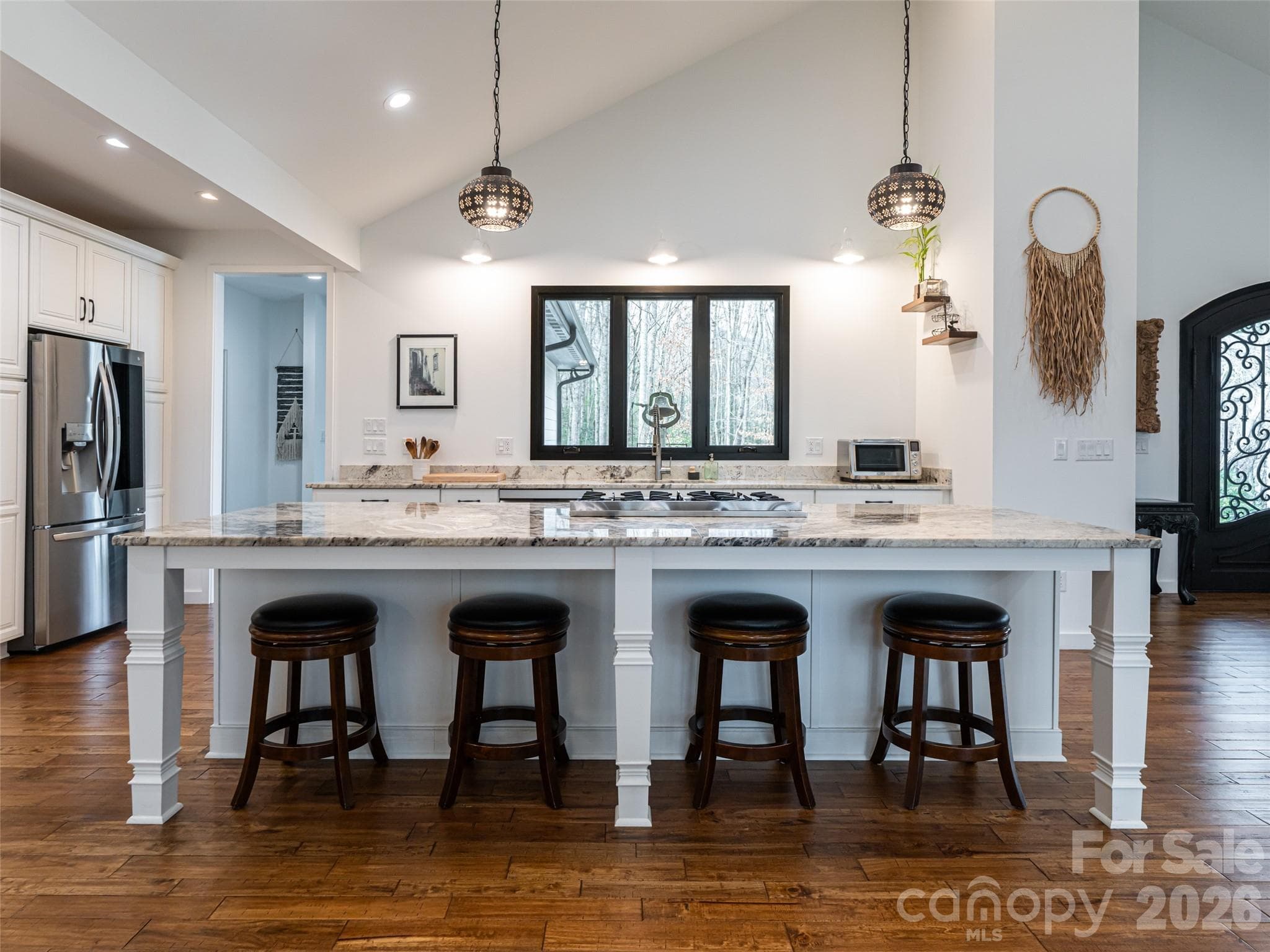 Large kitchen island with Brazilian Granite counters - 508 Avery Creek Road, Arden