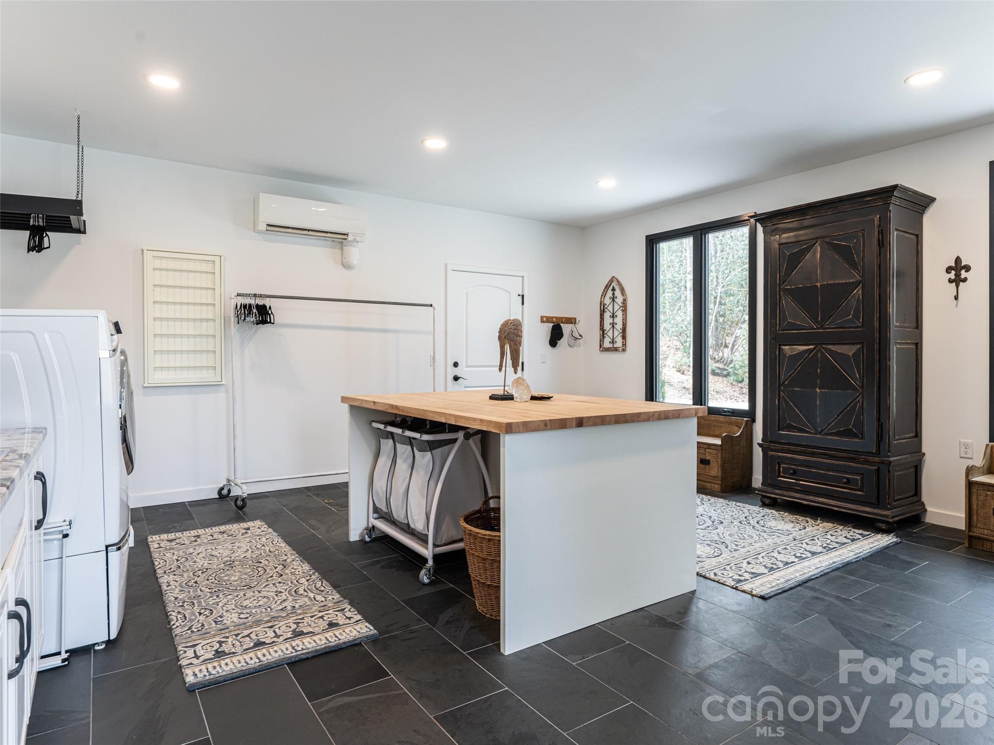 Spacious Mud Room with folding table and dog washing station - 508 Avery Creek Road, Arden