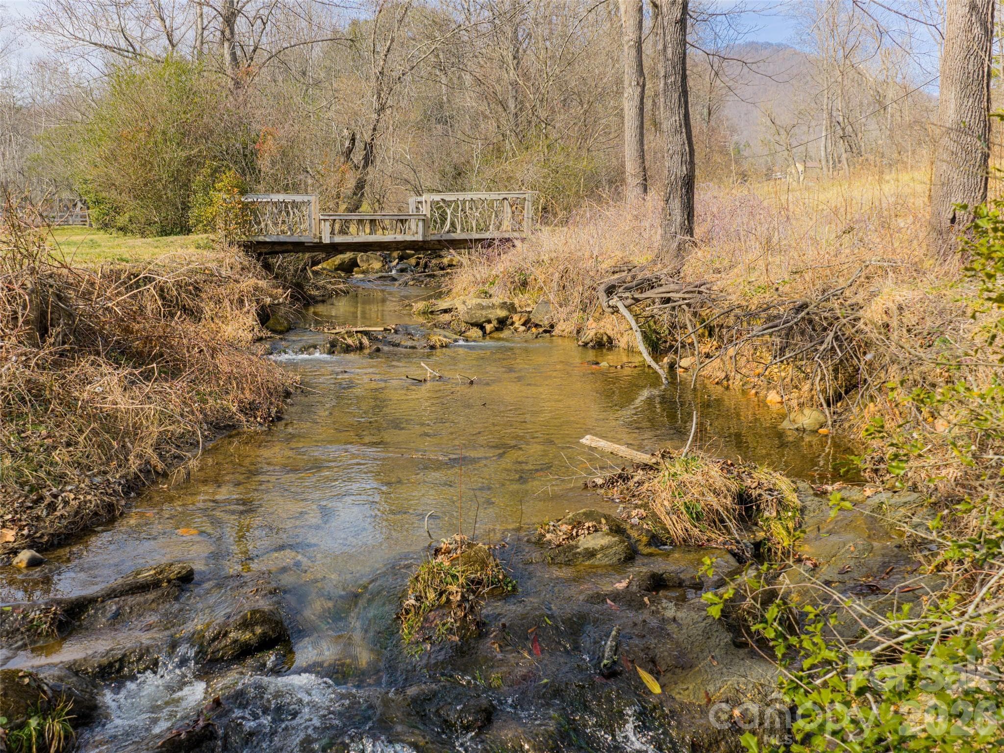Avery Creek with Walking Bridge in the winter - 508 Avery Creek Road, Arden