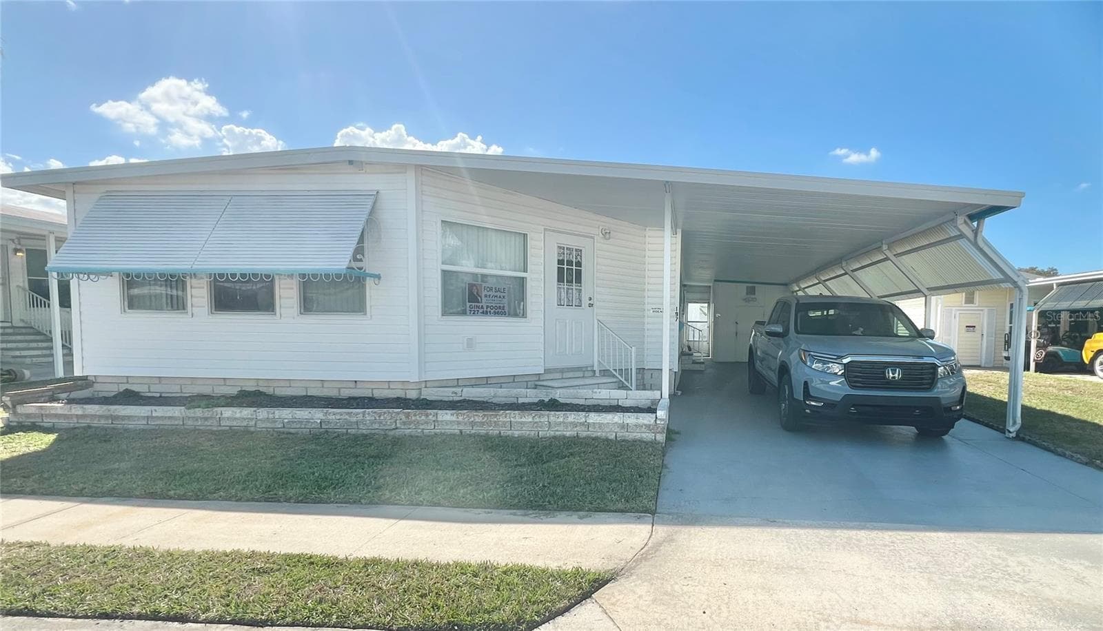 Front SE corner of home - 1100 BELCHER RD S #197, LARGO
