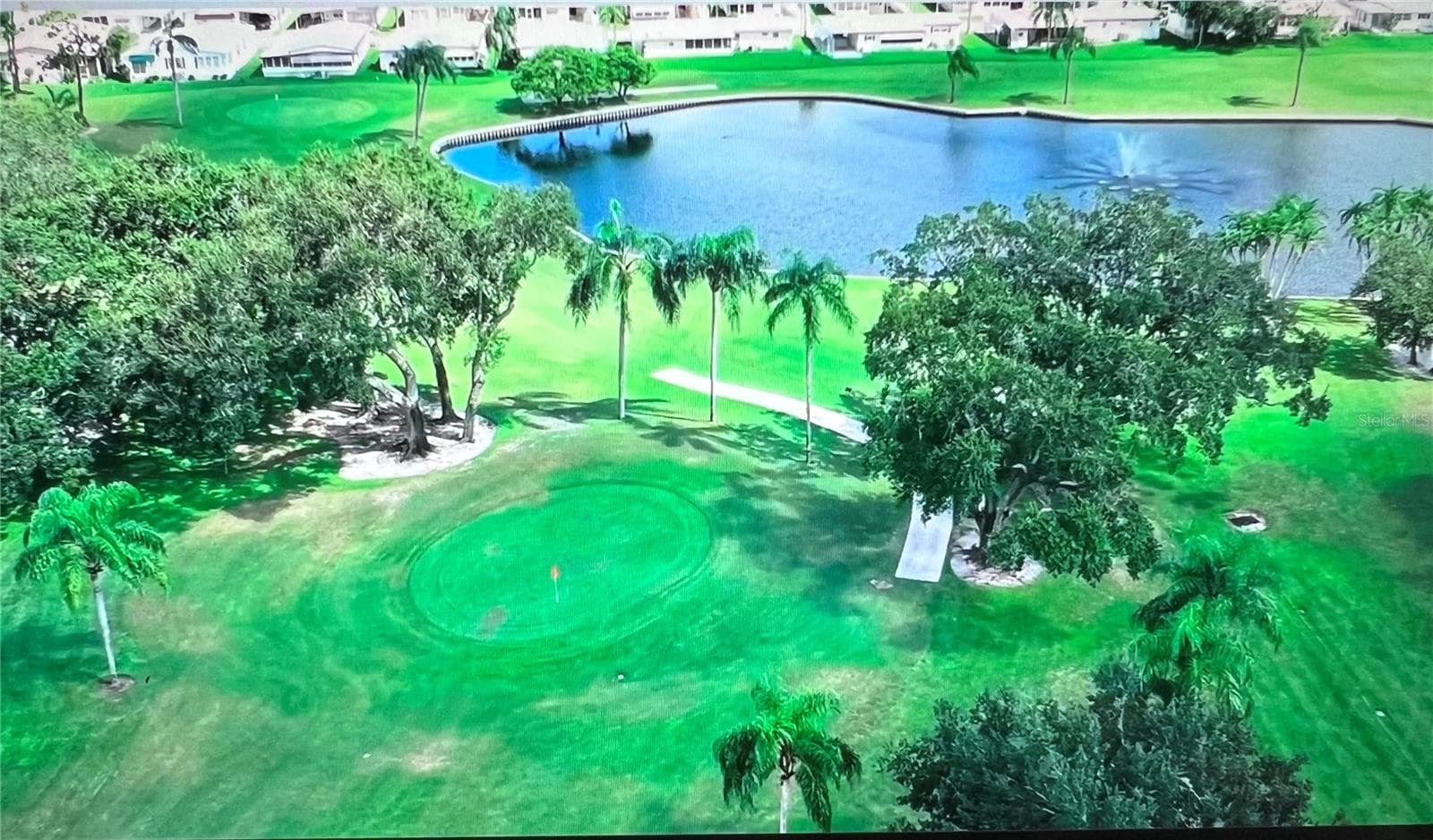 Drone view of Golf course 6th green - 1100 BELCHER RD S #197, LARGO